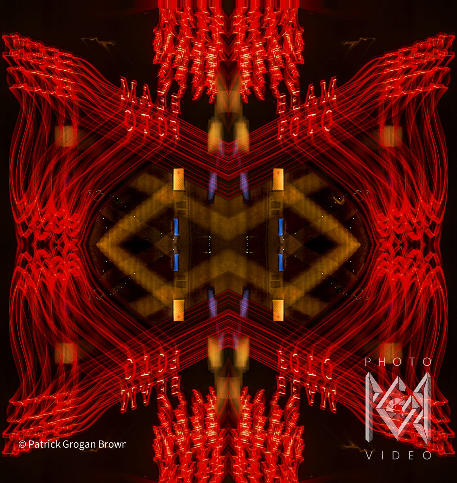 Red neon light trails and a FOTO sign mirrored four ways into a symmetrical figure around a glowing amber centre