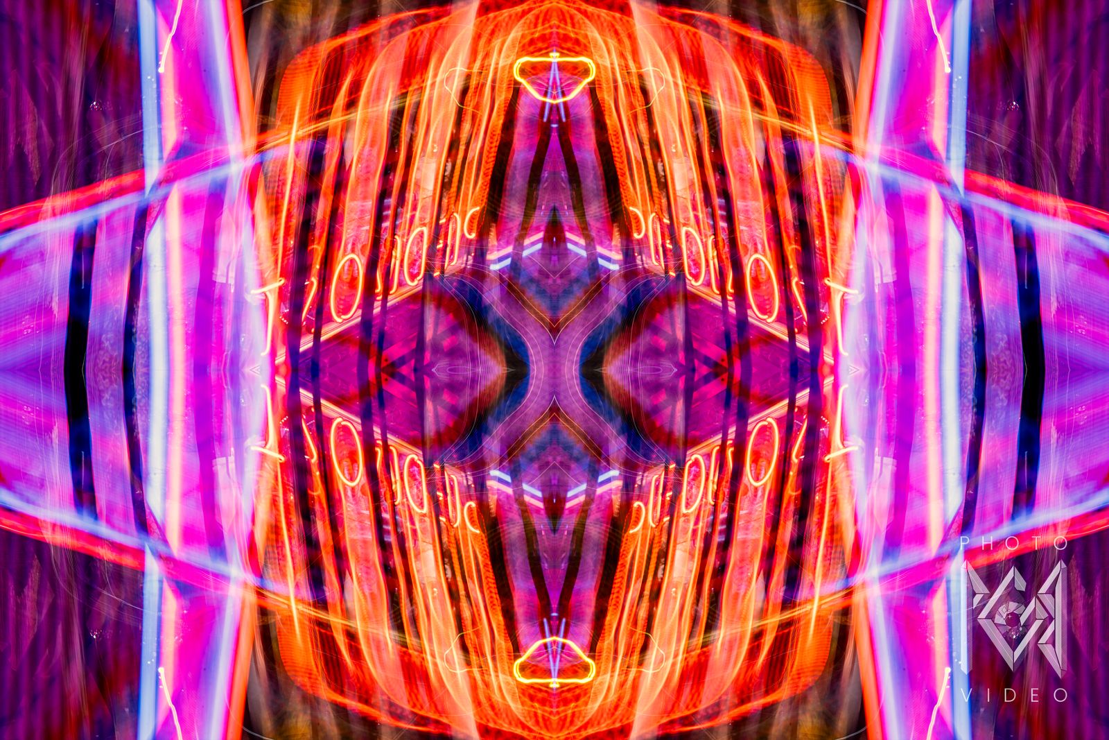 Orange and pink neon streaks mirrored around a violet centre