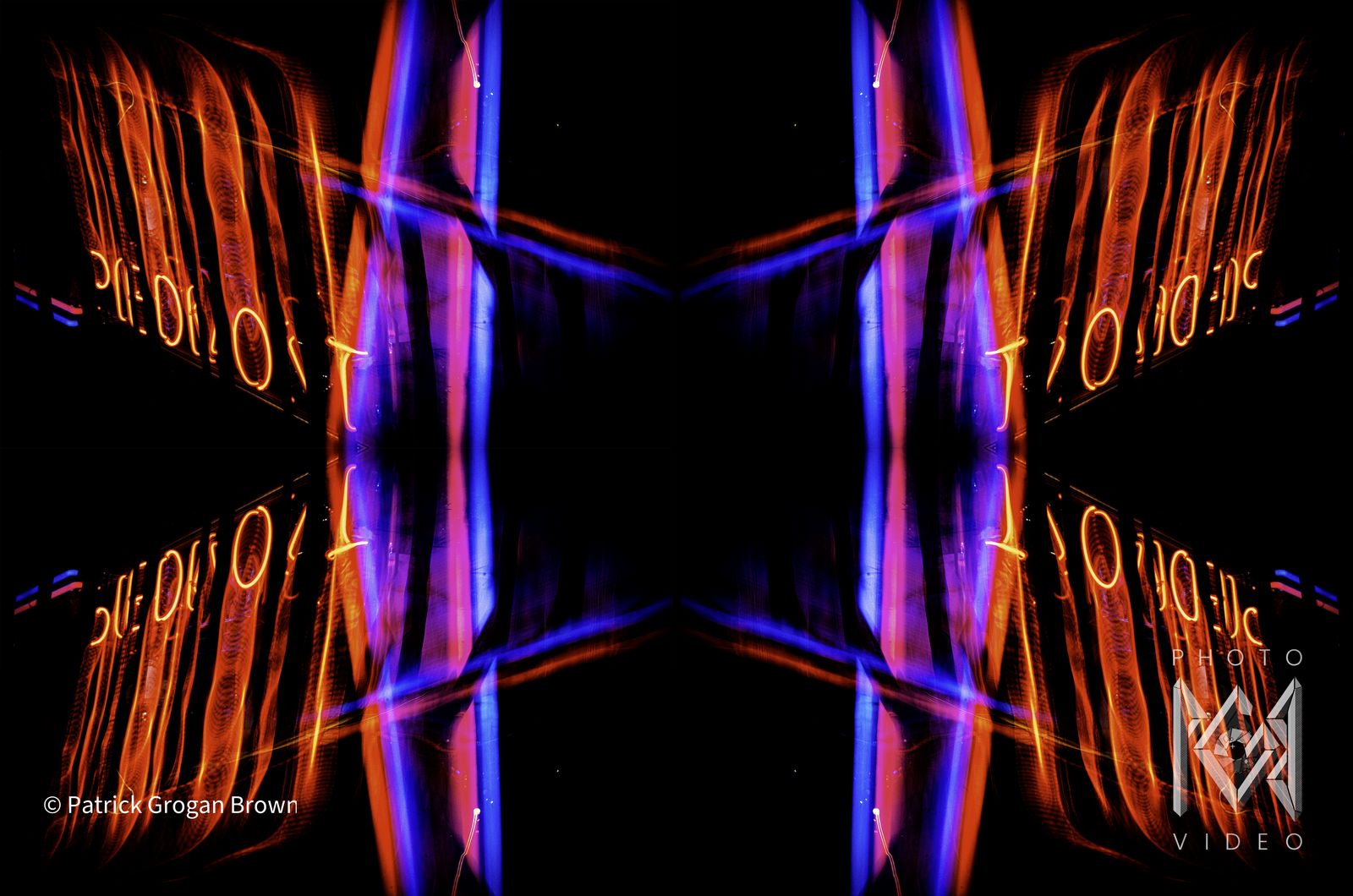 Orange neon lettering and violet light bars mirrored into a cross shape on black