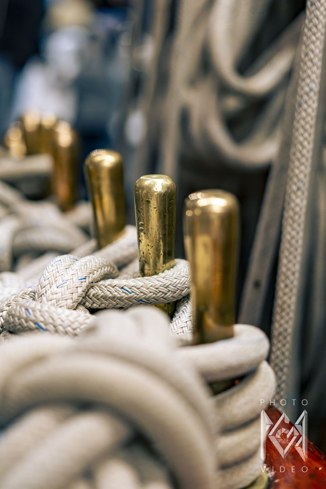 Brass belaying pins with coils of white line