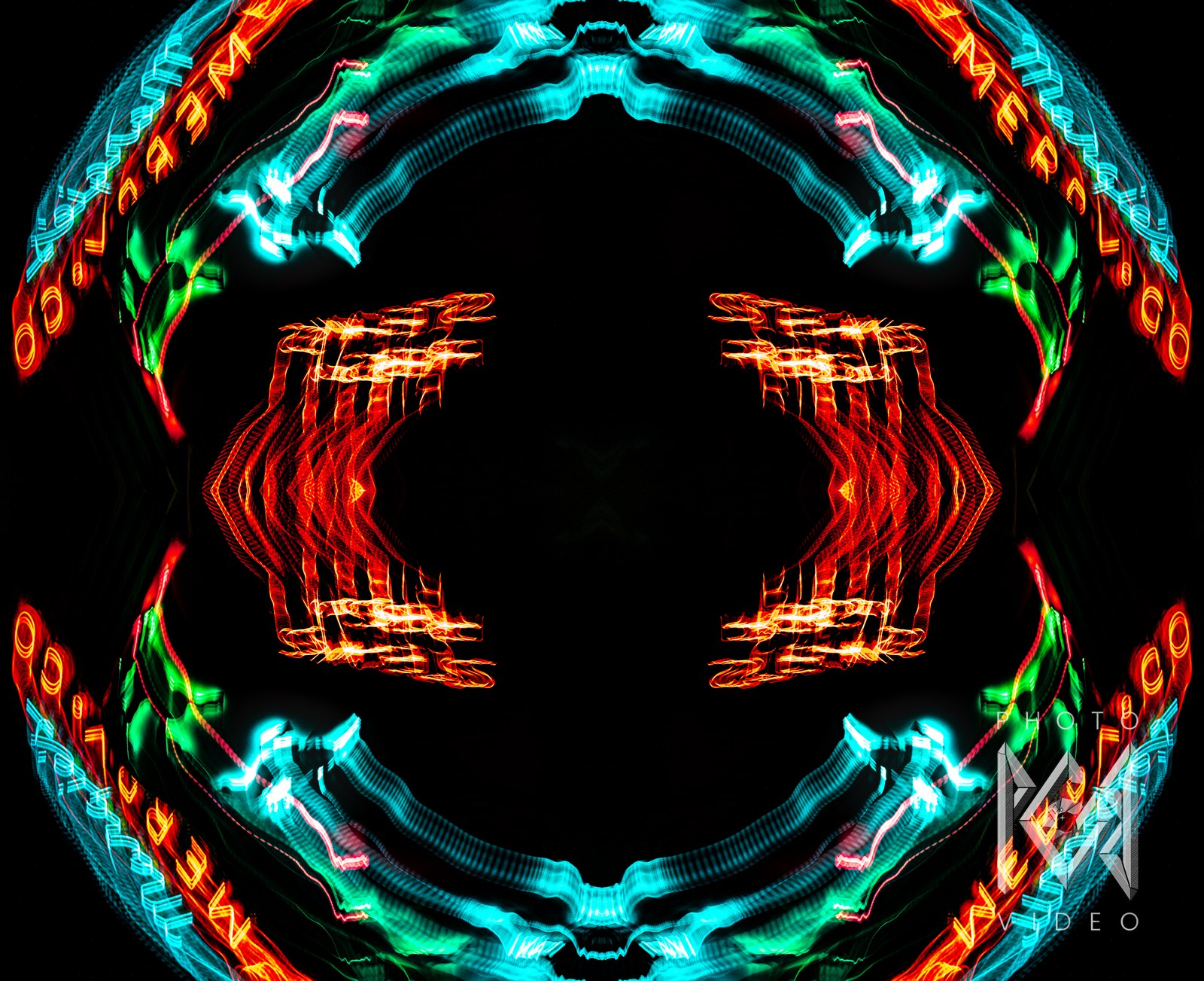 Merry-Go-Round neon lettering and light trails mirrored into a circle of cyan, red and green on black
